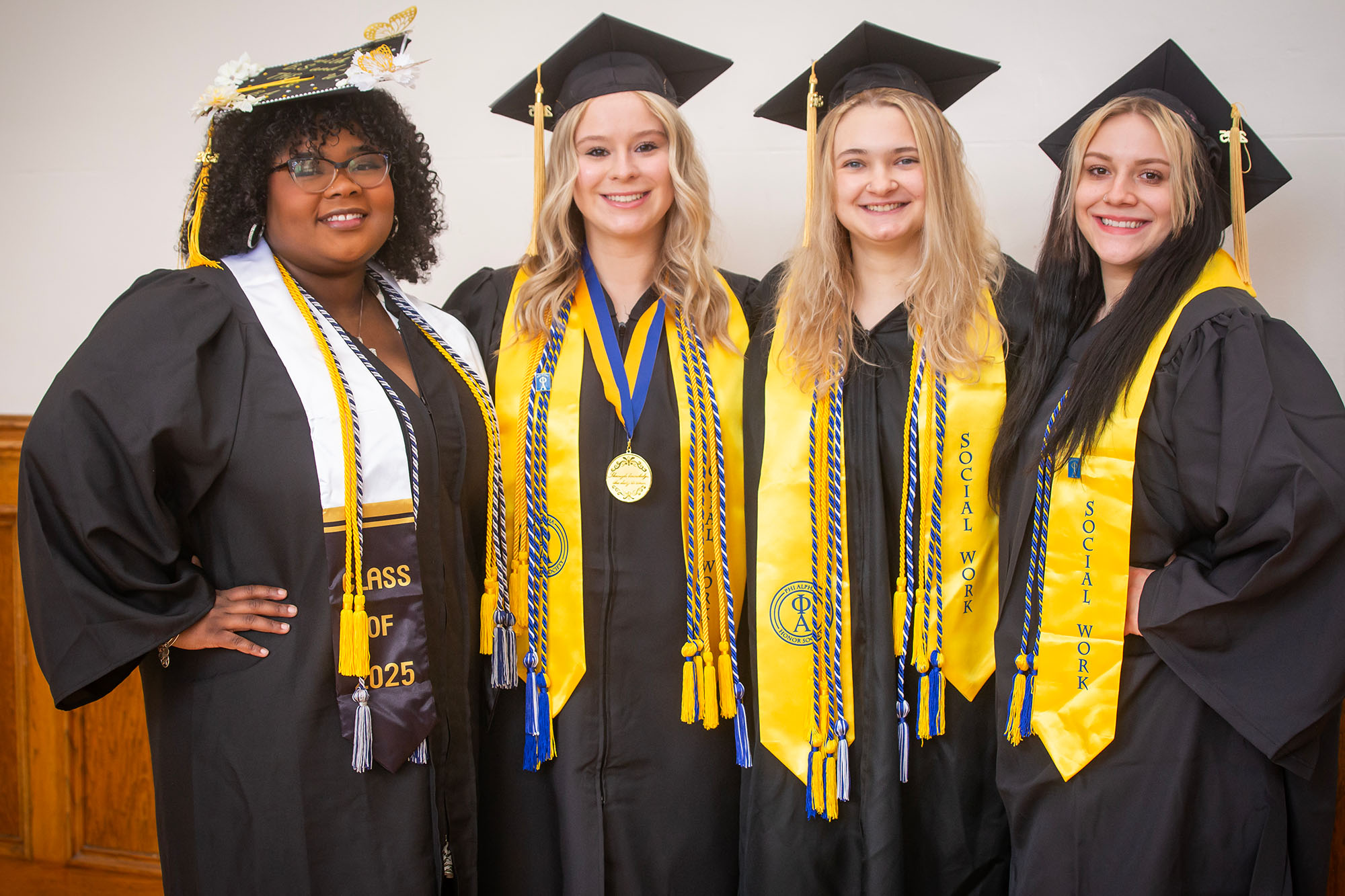 Students looking at a phone together