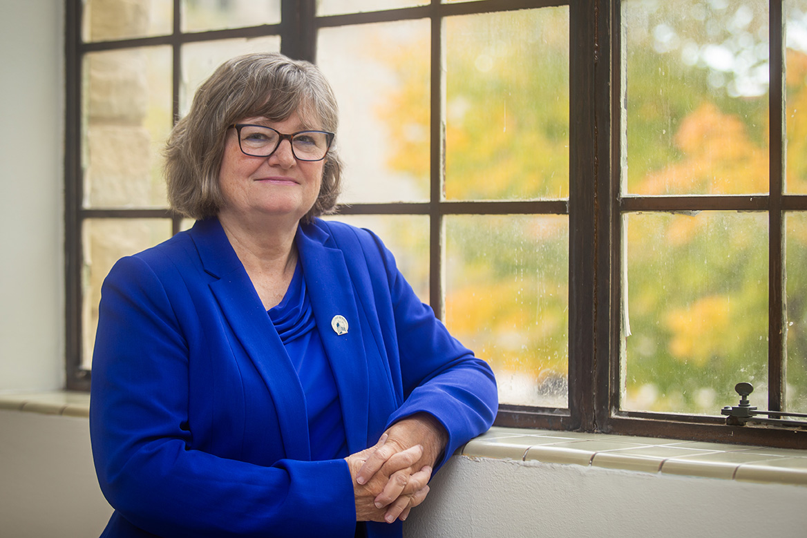 Friends Looking at Phone Together