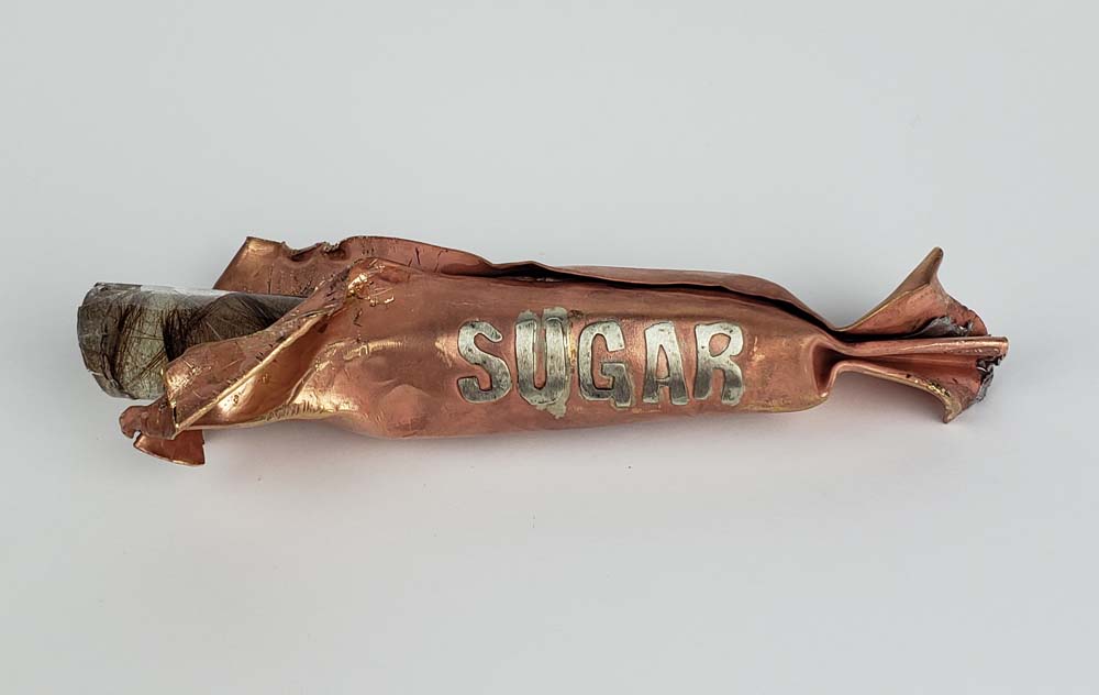 Partially Produced with Genetic Engineering - (Sugar Candy) 2018 - 5.5inL x 2inW x 1.5inT - Metal, Mixed Media