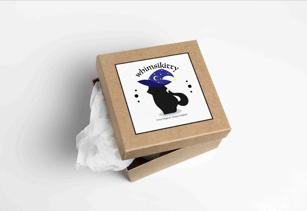 The Whimsikitty project features the fictional brand of Whimsikitty, a witchcraft shop that sells crystals, herbs, and offers services such as tarot and palm reading. Featured are two variants of the primary logo, one on a shop front and the other on a cute little box.